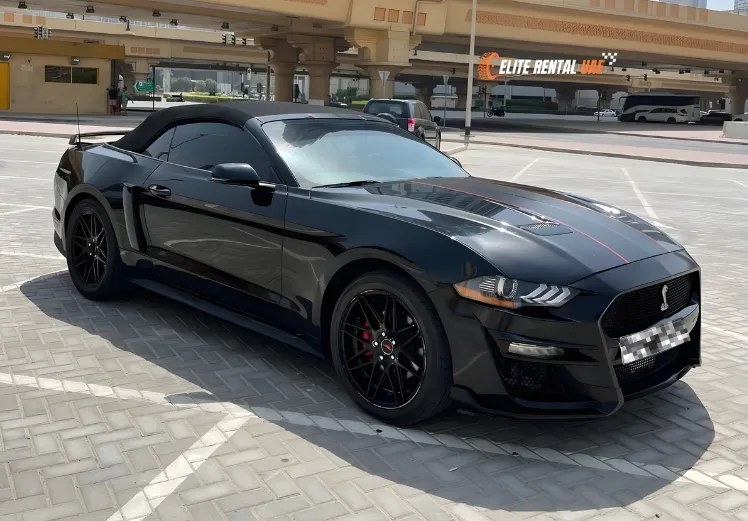 Ford Mustang Convertible Black side profile available for hire in Dubai and all over the UAE