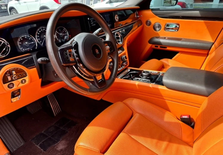 Luxury interior of white Rolls Royce Ghost with executive comfort
