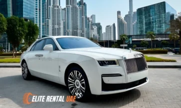 Side profile of white Rolls Royce Ghost showcasing premium luxury design