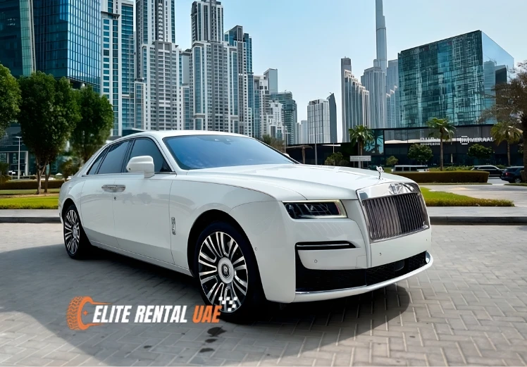 Side profile of white Rolls Royce Ghost showcasing premium luxury design