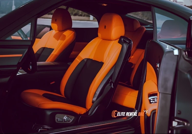 Luxury interior of black Rolls Royce Wraith with premium craftsmanship and comfort