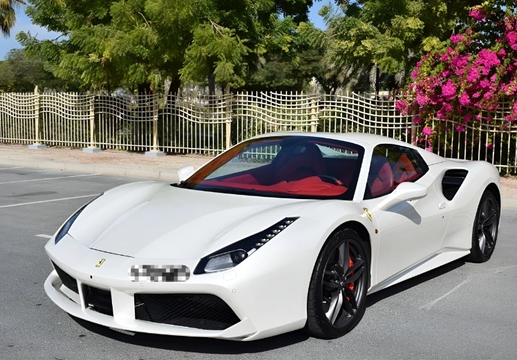 White Ferrari 488 Spider right front view luxury convertible supercar rental in Dubai UAE