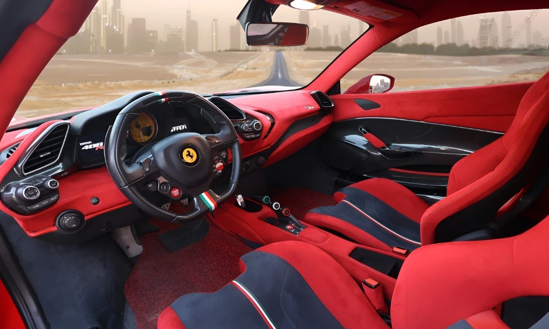 Ferrari 488 Pista interior with carbon fiber dashboard luxury supercar rental Dubai UAE