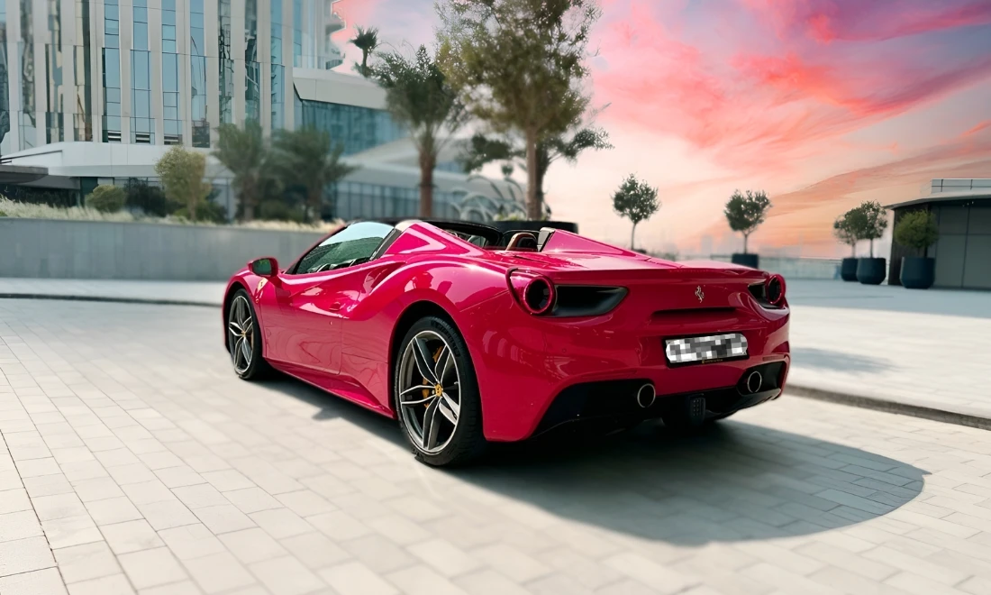 Red Ferrari 488 Spider rear side angle exotic convertible sports car rental in Dubai UAE